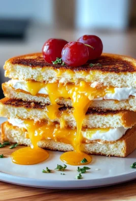 Delicious Breakfast Grilled Cheese Plated with Fresh Herbs