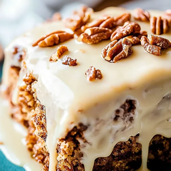 Delicious Butter Pecan Praline Poke Cake Ready to Serve
