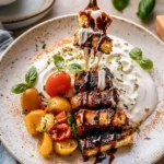 Delicious Chicken Tzatziki Rice Bowl Garnished with Herbs