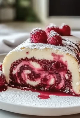 Raspberry Swirl Christmas Roll - A Festive Dessert Delight