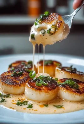 Seared Scallops with Spicy Cajun Cream Sauce Plated