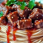 Sweet and Spicy Garlic Steak Pasta served on a plate
