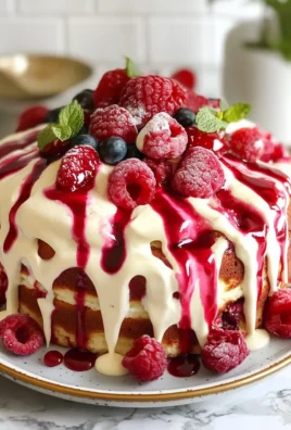 Red Velvet Marble Waffles Topped with Cream Cheese Drizzle