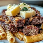 Savory Garlic Butter Steak Tips Served with Cheesy Rigatoni