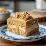 PEANUT BUTTER SHEET CAKE WITH FLUFFY PEANUT BUTTER FROSTING